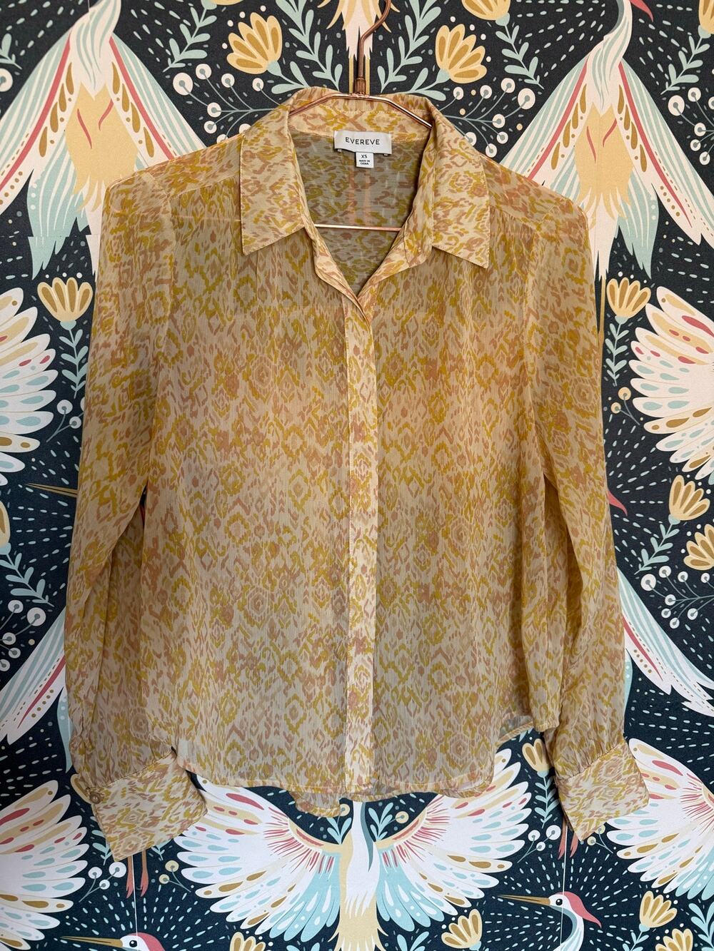 Evereve Emma Ikat Chiffon Top in a yellow-gold sheer ikat print. XS
